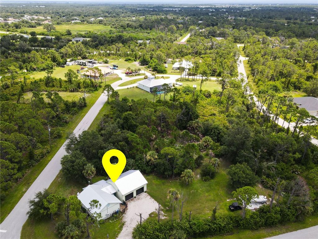 Photo of 7348 Coach Road, Port Charlotte, FL 33981 (MLS # C7512960)