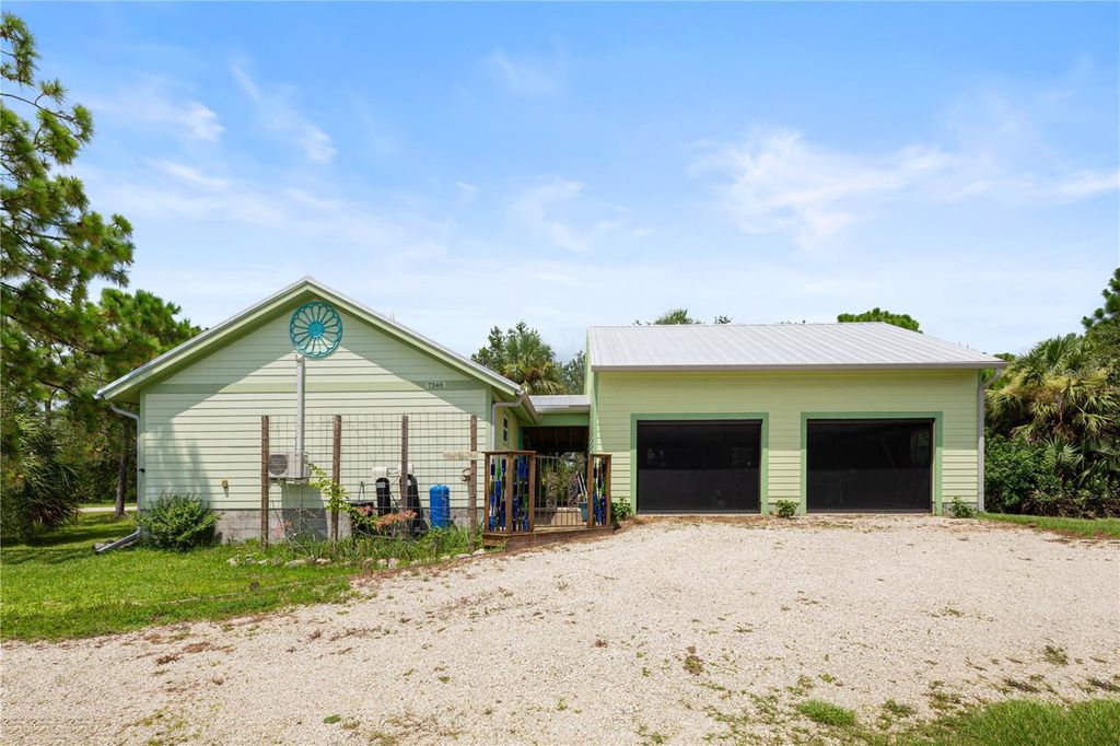 Photo of 7348 Coach Road, Port Charlotte, FL 33981 (MLS # C7512960)