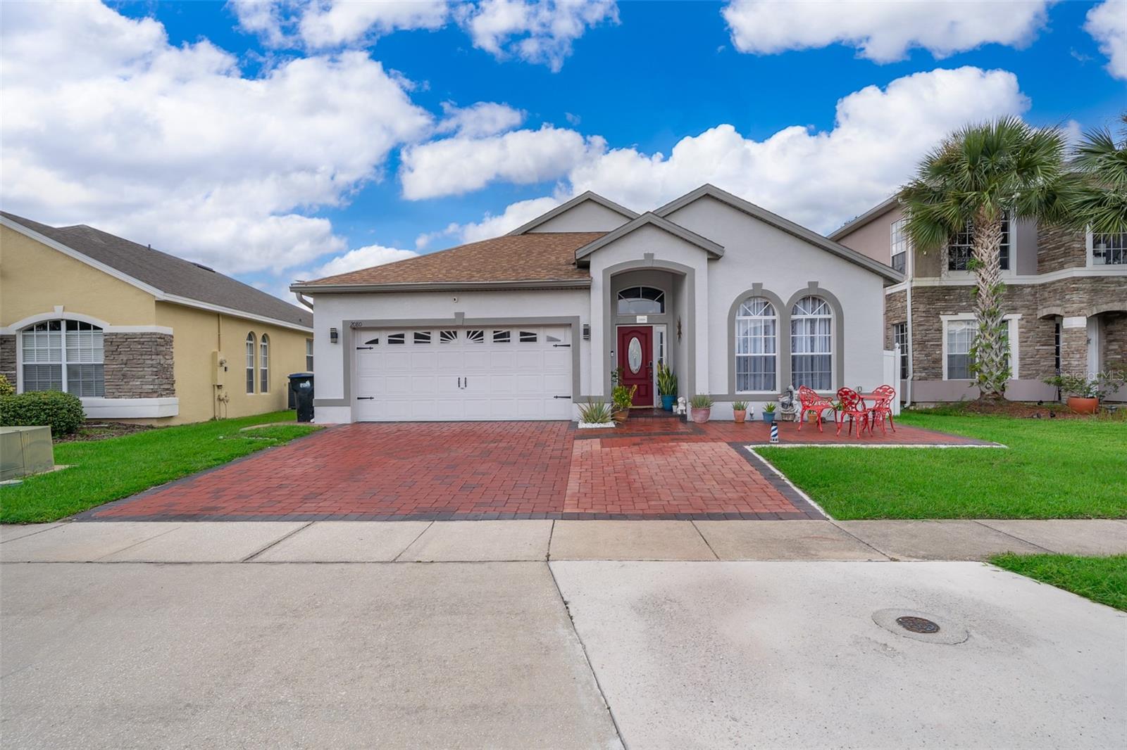 Beautifully Well-maintained 4-bedroom, 2-bath home in a sought-after gated community in South Orlando. This spacious, move-in-ready property features no carpet—ceramic tile flooring throughout. The open-concept layout connects living, dining, and kitchen areas for easy entertaining and everyday living. Abundant Natural Light with Large Windows. Enjoy added comfort with an 2-Car garage with Extended driveway that can offer additional parking, security from a fully fenced backyard and with Well-Maintained Landscaping. Community amenities include a resort-style pool. Conveniently located near major highways, shopping, dining, and schools and the Beautiful Medical City in Lake Nona. A must-see!