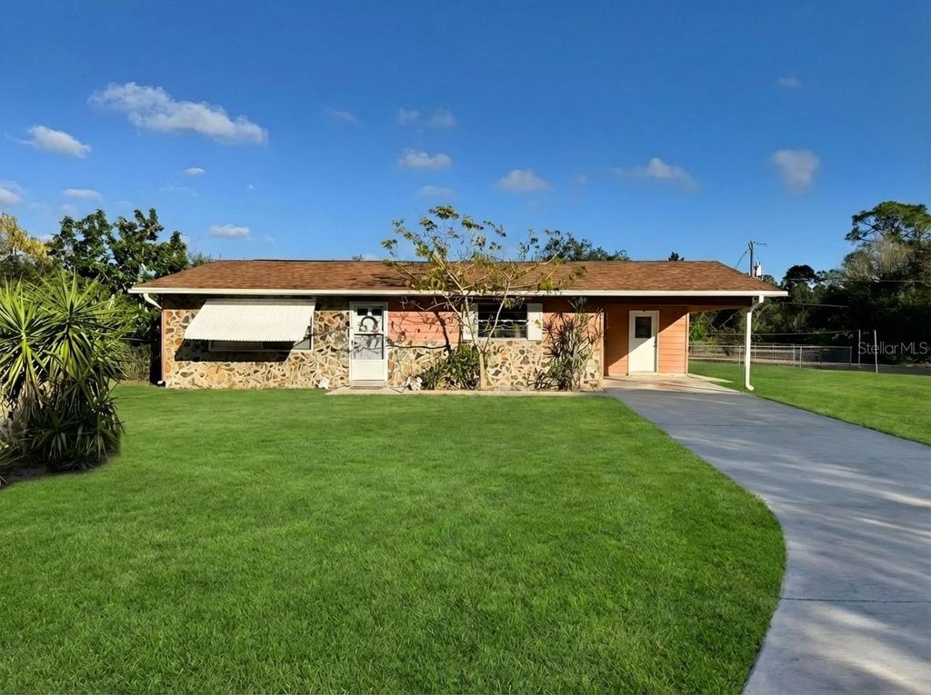 Photo of 12438 Poem Avenue, Punta Gorda, FL 33955 (MLS # A4679808)