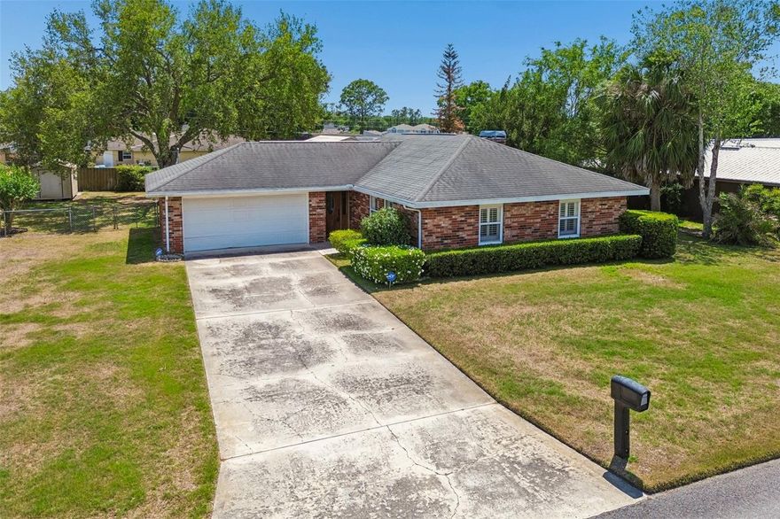 Welcome to 317 Greenwoods Drive, Lakeland, FL 33813—an exceptional opportunity in a highly desirable South Lakeland location! Tucked away on a quiet cul-de-sac just off South Florida Avenue, this well-maintained block and brick home sits on a spacious lot surrounded by beautiful, mature oak trees that create a truly inviting setting. Offering 3 bedrooms, 2 bathrooms, and a 2-car garage, the home features a flexible layout with the third bedroom currently set up as a dining room, easily converted back to suit your needs. Enjoy a spacious screened-in back porch overlooking the fully fenced backyard—perfect for relaxing or entertaining—complete with a versatile shed ideal for storage, a workshop, or your own “man cave.” The property is serviced by a well, helping keep utility costs in check, and includes a washer and dryer for added convenience. Just minutes from shopping, dining, and Loyce Harpe Park (Carter Road Park), known for its trails, sports facilities, and outdoor recreation, this home offers the perfect blend of comfort, location, and lifestyle. Homes like this in South Lakeland don’t last—schedule your private showing today before it’s gone!