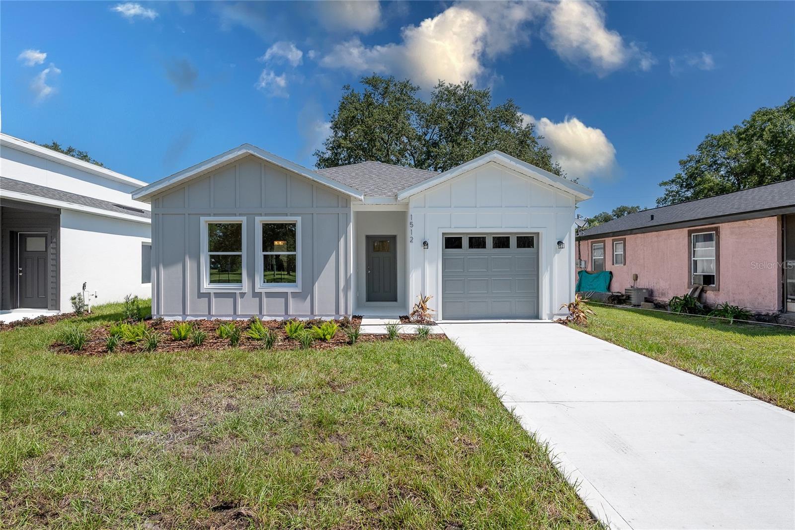 Be the first to live in this beautifully constructed 3-bedroom, 2-bath home in the heart of Sanford! This solid block new construction offers peace of mind, modern features, and a low-maintenance lifestyle. This home is perfect for families, professionals, investors or anyone looking for a fresh start. Step inside and enjoy the open layout, luxury vinyl plank flooring, and designer finishes throughout. The kitchen stuns with 42” shaker cabinets, quartz countertops, and plenty of cabinet space, ideal for cooking and entertaining. Retreat to the private primary suite featuring a spacious walk-in closet and elegant bath. Outside, enjoy tropical landscaping, a one-car garage, and a prime lot with curb appeal to spare, all with no HOA restrictions. Rest easy knowing your home comes with a builder warranty, new HVAC, plumbing, and electrical, and the efficiency of low maintenance new construction. Just minutes from Sanford’s vibrant town center, shopping, hospitals, and an easy drive to Orlando, this location blends convenience with a growing, up-and-coming community feel. Ready to make it yours? Schedule your private tour today and step into your new home! Be sure to check out the newly built home next door!