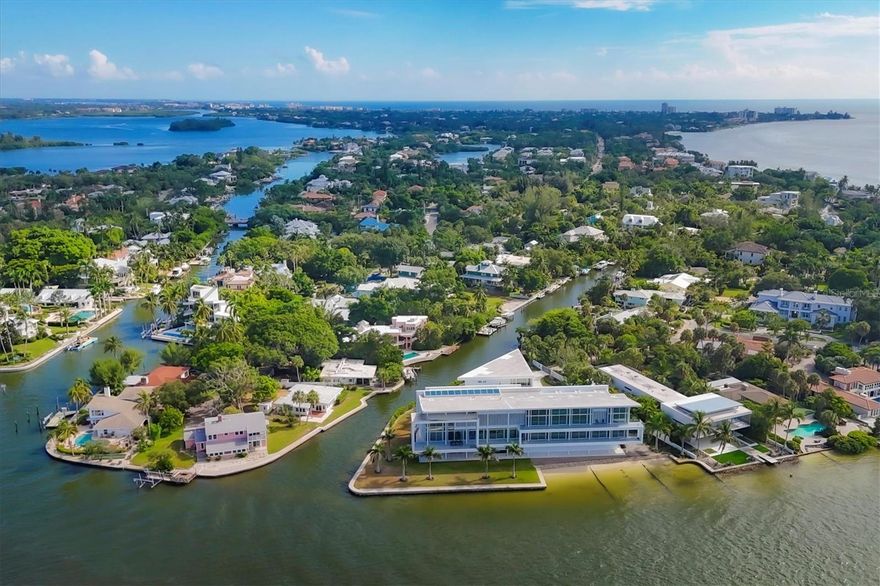 For the first time in 70 years, “Blue Bayou” at 3210 Higel Avenue has come to market. This is a once in a lifetime opportunity to own part of the most desirable northern end of Siesta Key.  This is a unique property at a unique time. Blue Bayou is currently the only buildable lot available with bay views, no-bridges-to-bay sailboat water, on a protected bayou with a seawall and boat slip, ready for your own custom dock.  North Siesta Key is arguably one of the best neighborhoods in Florida, private, quiet and peaceful, with friendly neighbors, and where each local street is a non-through street. Enjoy fishing, boating, kayaking, and paddleboarding from your backyard. Just a short distance away is your own sandbar full of amazing wildlife for snorkeling, fishing, exploring, swimming, or just relaxing. Also explore Sharker’s Island sandbar, and Lido beach, both within close proximity to your own private oasis. From your windows, lawn, patio, rooftop deck, or infinity pool you might relax in the evening seeing roseate spoonbills in golden sunsets on the bay, as well as the glistening lights of downtown Sarasota. At night, the quiet waves with birdcalls and the city lights in the distance reflect off the calm bay waters. Great egrets, snowy egrets, night herons, great blue herons, black skimmers, owls, and both brown and white pelicans are often seen or heard from this, your new home. This unique property is ready for development - survey, zoning and environmental documentation is available upon request.