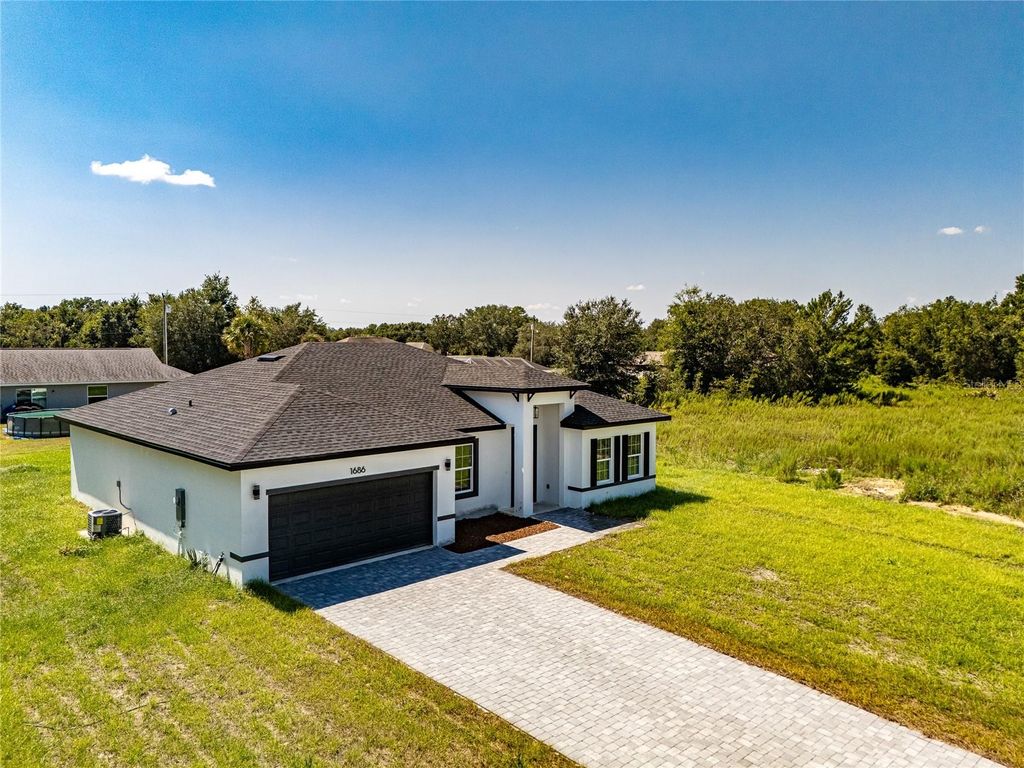 Photo of 1686 SW 162nd St, Ocala, FL 34473 (MLS # O6346418)