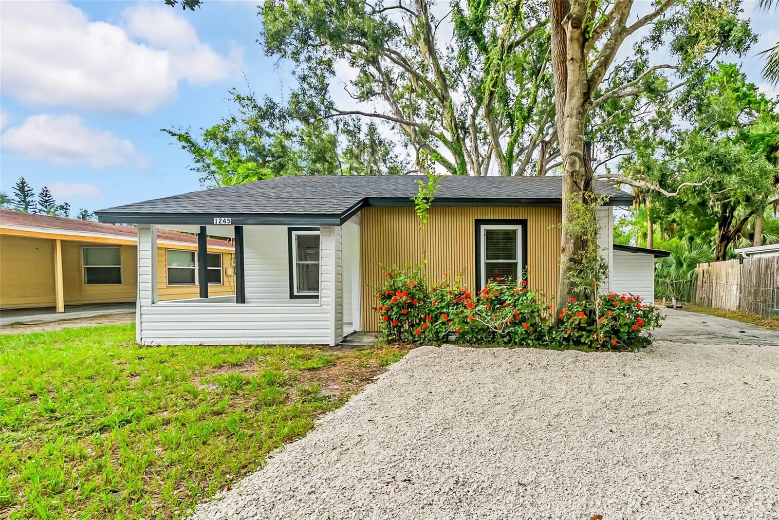 One or more photo(s) has been virtually staged. Stylish updates meet everyday function in this North Sarasota 3-bedroom, 1-bath home—perfect for a first-time buyer ready to stop renting and start building equity. Inside, you’ll find new luxury vinyl plank flooring throughout, fresh interior paint, new appliances, and a thoughtfully refreshed layout that maximizes space. The covered porch is a great spot to catch your breath before the day begins, and the oversized parking pad off the driveway makes room for guests, a trailer, or extra vehicles. Located just minutes from downtown and under 10 minutes to Sarasota Bay, this home also sits in a highly bikeable area—ideal for easy commutes and weekend exploring. Roof 2021. Located in a non-flood zone.