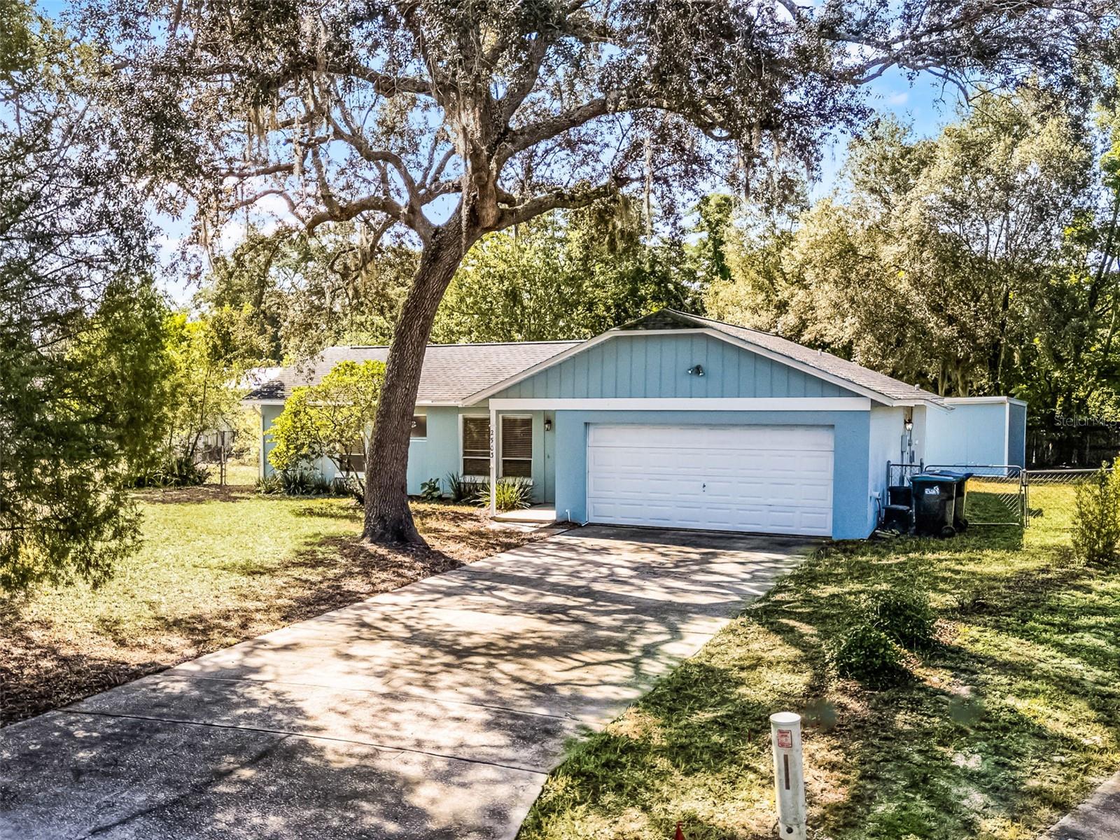 One or more photo(s) has been virtually staged. RARE CUL-DE-SAC HOME ON OVERSIZED .31 ACRE LOT — MINUTES FROM UCF, FULL SAIL, DOWNTOWN ORLANDO & WINTER PARK! This updated 3 BED, 2 BATH home sits at the end of a quiet CUL-DE-SAC with NO THROUGH TRAFFIC and one of the largest lots in the community. Enjoy the peace and privacy of a spacious fenced yard while still being moments from the best that East Orlando has to offer. FULLY ENCLOSED BACK PORCH with large windows added in 2023 and flexible use space. This solid block home has had MAJOR SYSTEM UPGRADES over the years including newer A/C SYSTEM (2021), full home REPIPE (2021–2023), newer water heater (2021), and FRESH Exterior Paint (2024).
BEAUTIFUL tall PASSION FRUIT cactus in the backyard. OPEN SPLIT FLOOR PLAN, with ENGINEERED WOOD FLOORING in the living room and two bedrooms, CERAMIC TILE in kitchen and dining, and a REMODELED KITCHEN with upgraded cabinets and layout. Primary bedroom features EN-SUITE BATH and serene backyard views. Two additional bedrooms offer flexibility for family, guests, or work-from-home setups. ENCLOSED SHED perfect for gardeners or hobbyists provides added convenience.
ALL THIS WITHIN 15–20 MINUTES OF UCF, ROLLINS COLLEGE, FULL SAIL UNIVERSITY, DOWNTOWN ORLANDO, AND ORLANDO INTERNATIONAL AIRPORT (MCO). Surrounded by top-rated schools, parks, shopping at WATERFORD LAKES and WINTER PARK VILLAGE, plus gyms and outdoor recreation nearby. NO HOA. This is the perfect spot for first-time buyers, investors, or college families looking for space, updates, and location.
Schedule your private showing today and ask your agent for the FULL LIST of updates included with this listing. WATCH the YOUTUBE video tour and backyard walkthrough, just search 2503 Poet Lane, Orlando Fl 32817!
