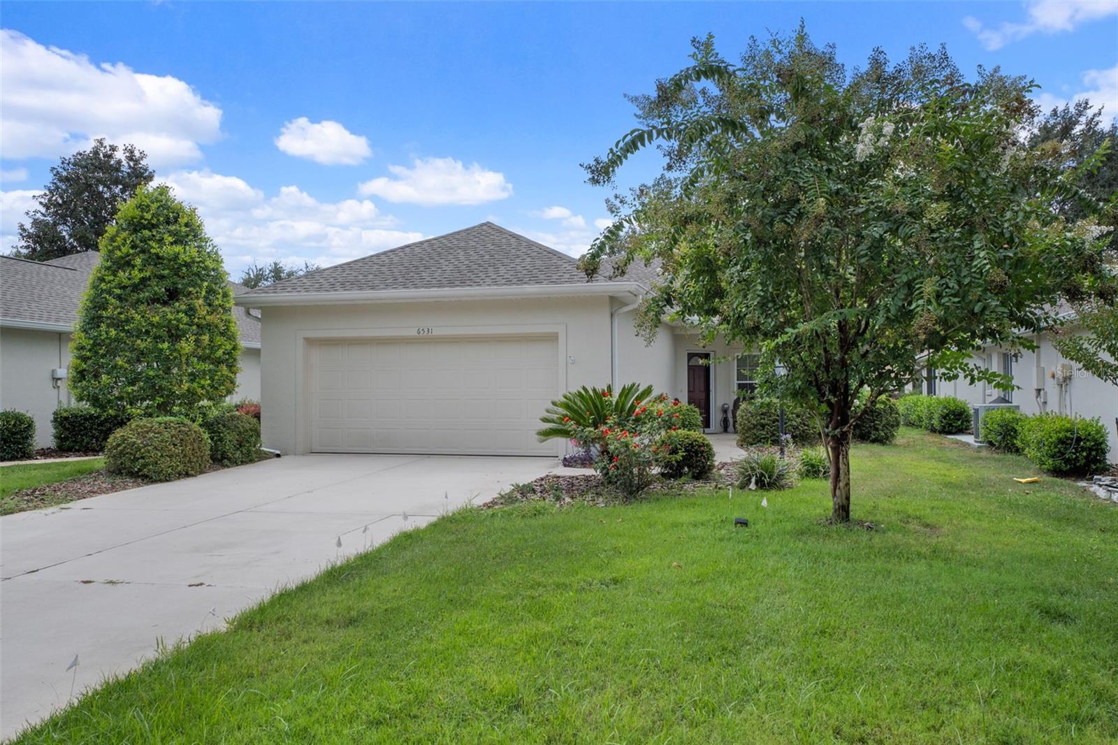 Nestled in the serene and picturesque Meadowcrest Fox Hollow HOA Community, this stunning villa home offers the perfect blend of comfort, elegance, and convenience. Built in 2006, this meticulously maintained residence boasts a generous total square footage of 2,340 with 1,746 square feet of thoughtfully designed living space. NEW Roof January 2024 and NEW Water Heater. As you step inside, you are greeted by an inviting open floor plan that seamlessly integrates the living, dining, and kitchen areas—great for both entertaining and everyday living. The spacious living room, while unique for its transformed window into a charming door that opens to your backyard, is a perfect gathering spot for family and friends, inviting you to embrace indoor-outdoor living with ease. The heart of this home is undoubtedly the eat-in kitchen, where culinary creativity can flourish. Equipped with ample counter space and modern appliances, it’s excellent for preparing meals or enjoying casual breakfasts with loved ones. Adjacent to the kitchen is a formal dining room that sets the stage for memorable dinner parties and celebrations. Retreat to the spacious primary bedroom, your personal sanctuary, featuring a luxurious en-suite bathroom complete with dual sinks and a refreshing shower. The walk-in closet provides an abundance of storage, ensuring your space remains organized and clutter-free. The additional bedroom is generously sized, offering comfort and privacy for family members or guests, while the second bathroom serves as a convenient oasis for all. Step outside to discover your own slice of tranquility. The small concrete pad in the backyard is supreme for al fresco dining or sipping your morning coffee in the warm sunshine, all within the maintenance-free living this community is known for. The park-like atmosphere of the Meadowcrest Fox Hollow enhances the overall experience, providing lush greenery and peaceful surroundings that invite leisurely strolls and leisurely afternoons in the sun. Residents of this vibrant community enjoy the Florida lifestyle with access to beautiful parks, walking trails, and an engaging social atmosphere. The HOA takes care of the maintenance, allowing you to spend more time enjoying the things you love. Don’t miss your chance to call this charming villa home! With its thoughtfully designed spaces, modern amenities, and prime location in the highly desirable Meadowcrest Fox Hollow, this property is truly a hidden gem. Schedule your showing today and step into a life of comfort and convenience!