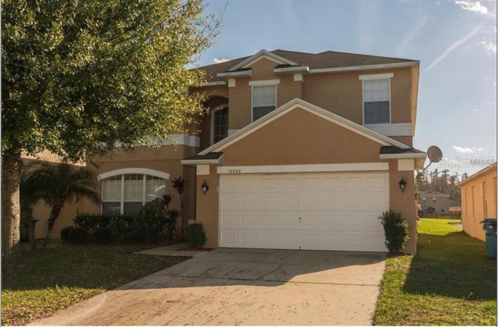 Photo of 10080 Savannah Bluff Lane, Orlando, FL 32829 (MLS # O6448662)