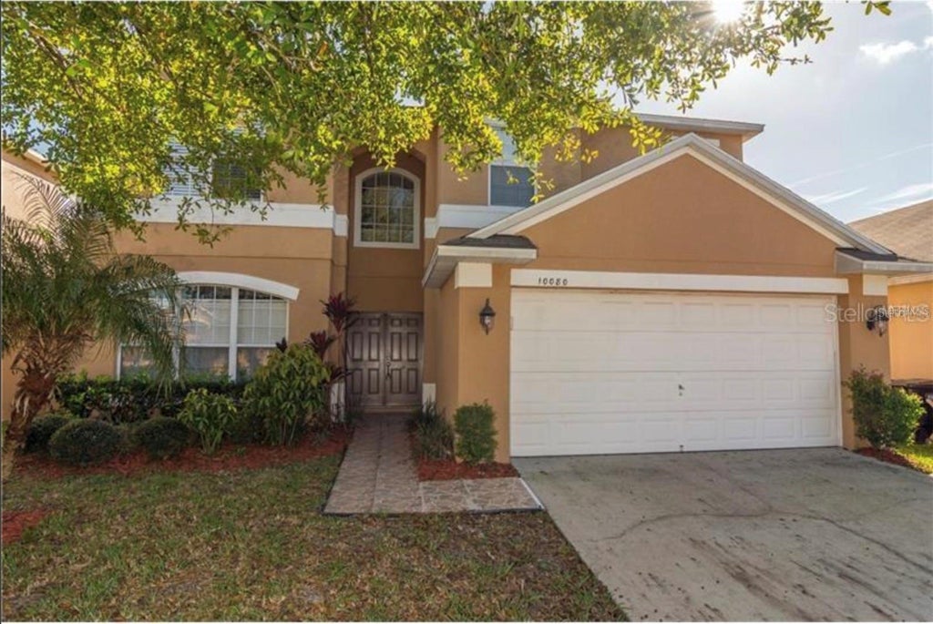 Photo of 10080 Savannah Bluff Lane, Orlando, FL 32829 (MLS # O6448662)