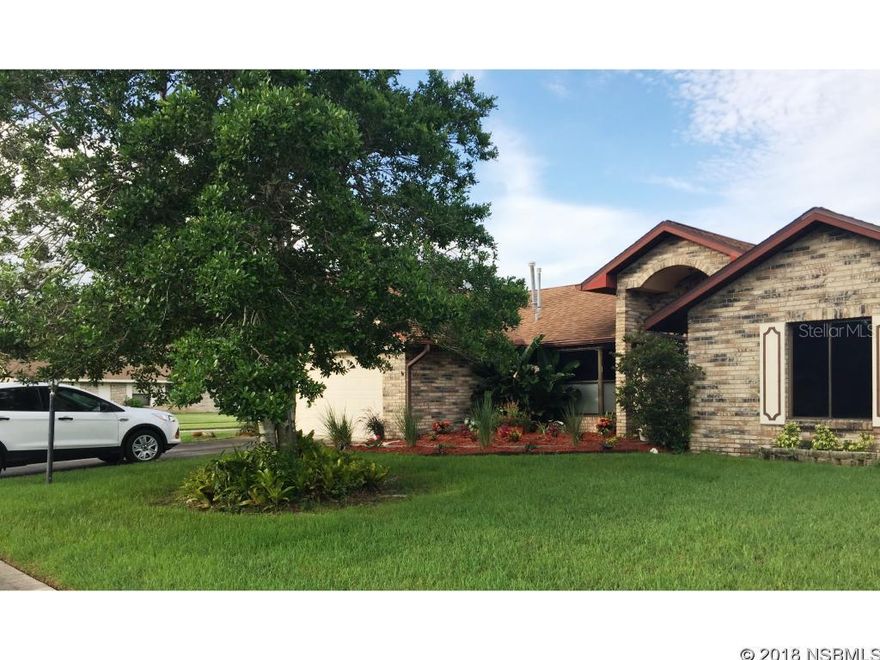 This is your chance to live in this great subdivision very close to shopping and very rural at the same time. Only 10 minutes to beautiful New Smyrna Beach. Great retirement or starter home 2/2/2 brick front home with a nice open floor plan and vaulted ceilings. On the corner with great lawn  lot is 79 x 103. Enjoy a brand new AC installed 5/2018, a water heater that's only 1.5 yrs old and much to sellers dismay a gas stove that's only 5 yrs old. (she would love to take it) Come enjoy this lovely neighborhood and make this house "your home"   The beach is waiting. ;Water: City