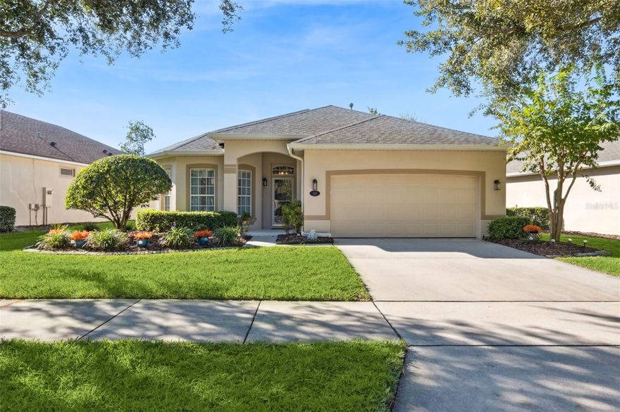Welcome to this meticulously maintained St. Joe Bluebill floorplan located in the desirable 55+ Victoria Gardens neighborhood. This 2 BD/2 BA home has a fenced backyard & a conservation area view, along with several updates such as Re-Roof 20’, electrical panel 20’, aluminum rail fenced backyard 23’ & A/C system in 2024. The spacious 15’ x 22’ Great Room provides flexible layout options and features a sliding glass door that opens to the expanded screened lanai overlooking the conservation area. The 11’ x 12’ dining room includes multiple windows that brings in abundant natural light and offer views to the private backyard. Throughout the home, you’ll find numerous personal touches such as engineered wood flooring, a glass front storm door and updated bathrooms. The kitchen is equipped with 42” Maple cabinets & a 5-burner electric glass top range. The 12’ x 15’ primary bedroom includes a ceiling fan and has direct access with a door to the en-suite bathroom, which features a raised height marble countertop vanity, dual sinks and a frameless glass enclosed walk-in shower with bench seat. You will love the outdoor living space on the 14’ x 16’ screen enclosed covered patio with ceiling fan offering a peaceful conservation view- ideal for relaxing or enjoying your morning coffee. The 20’ x 22’ garage provides generous additional space for storage. Laundry room comes with the washer, an electric dryer & a natural gas connection for future flexibility. This well-maintained home combines comfort, thoughtful updates, and a serene natural setting- ready for its next homeowner to make it their own. Victoria Garden residents have access to their own Private Clubhouse. HOA fee includes lawn care, Spectrum HFC TV & internet, and reclaimed water for yard irrigation. Community is within 1 mile of I-4 that offers great access to the east coast beaches, Orlando (40 minutes) and 3 International airports within 1 hour.