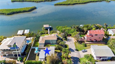 Photo of 830 Garfish Avenue, New Smyrna Beach, FL 32169 (MLS # O6364680)