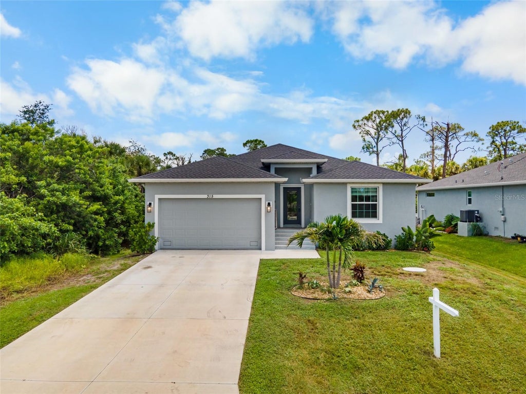 Photo of 315 Sweetwater Drive, Rotonda West, FL 33947 (MLS # D6148281)