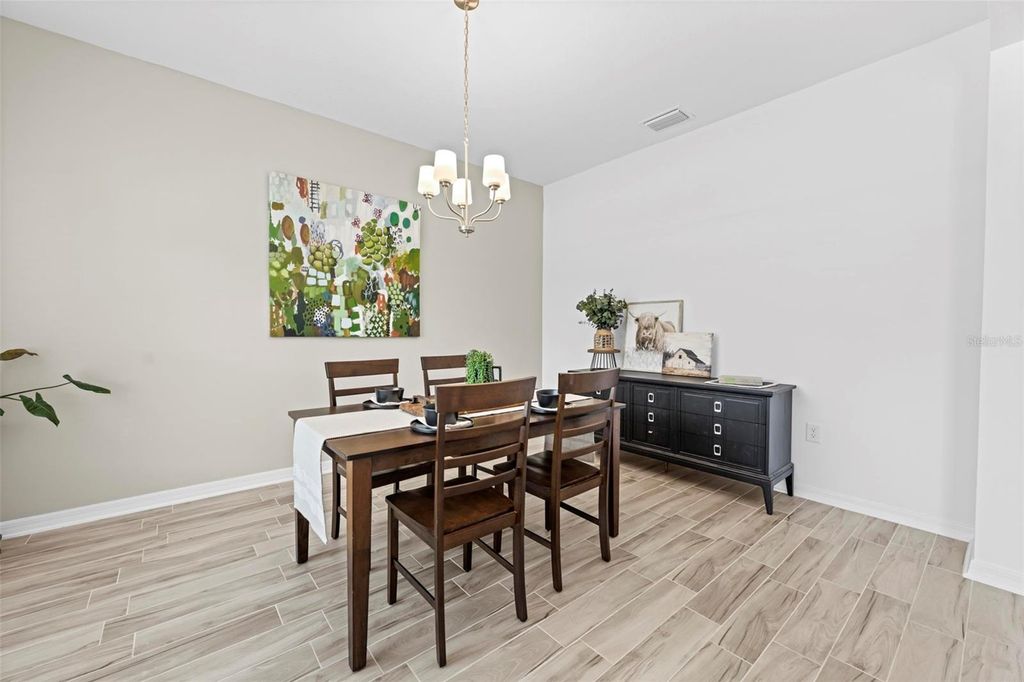 Photo of 12107 Nouveau Avenue, Spring Hill, FL 34610 (MLS # TB8370004)