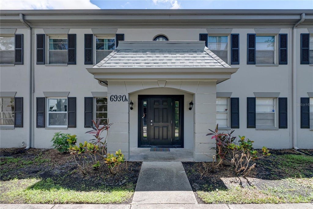 Photo of 6930 Place De La Paix #1A, South Pasadena, FL 33707 (MLS # TB8546095)