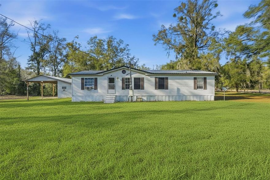 INCOME PRODUCING PROPERTY!!! 3 Bed 2 Bath on a little over 3 acres of land. NO FLOOD, NO HOA. Monthly rental income 1050. Month-to-month lease in case buyer wants to occupy the house or raise the rent.