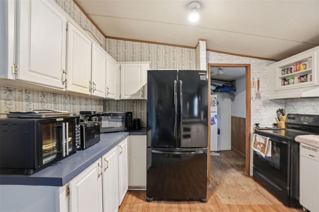 Photo of 144 NE 159th Avenue, Old Town, FL 32680 (MLS # W7883585)