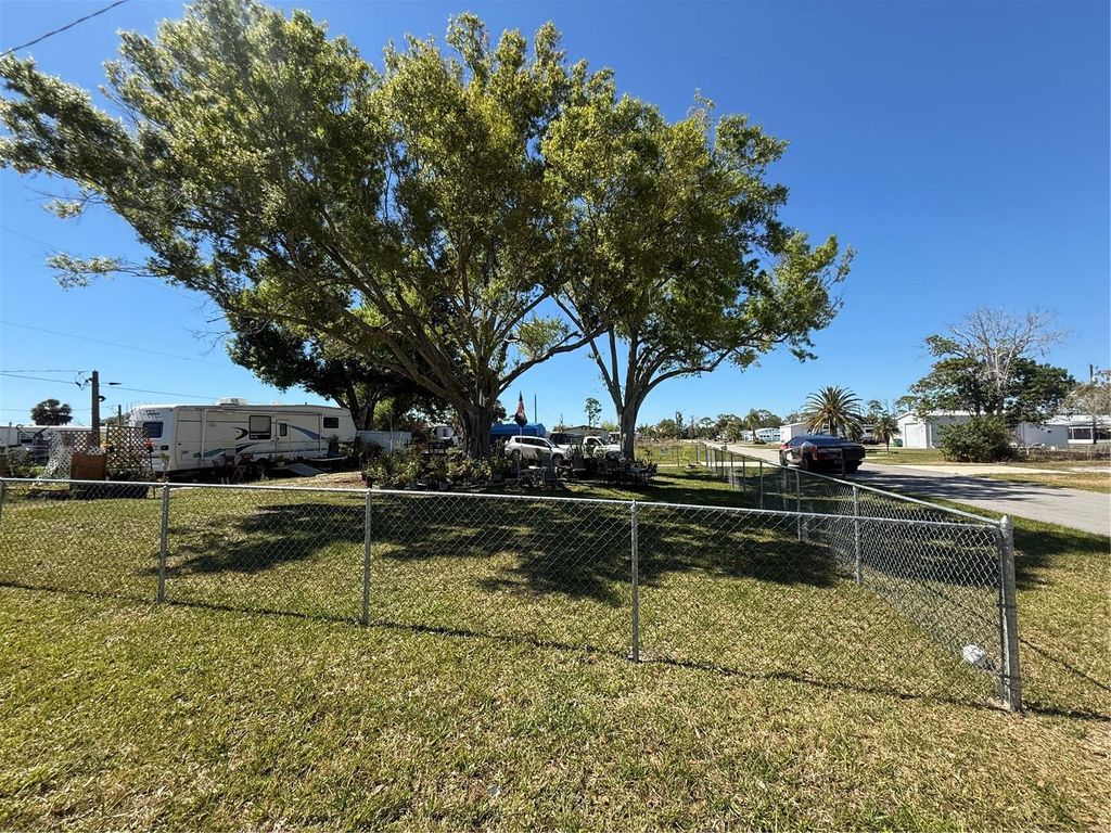 Photo of 3830 Bravo Rd. Road, Port Charlotte, FL 33953 (MLS # A4687304)