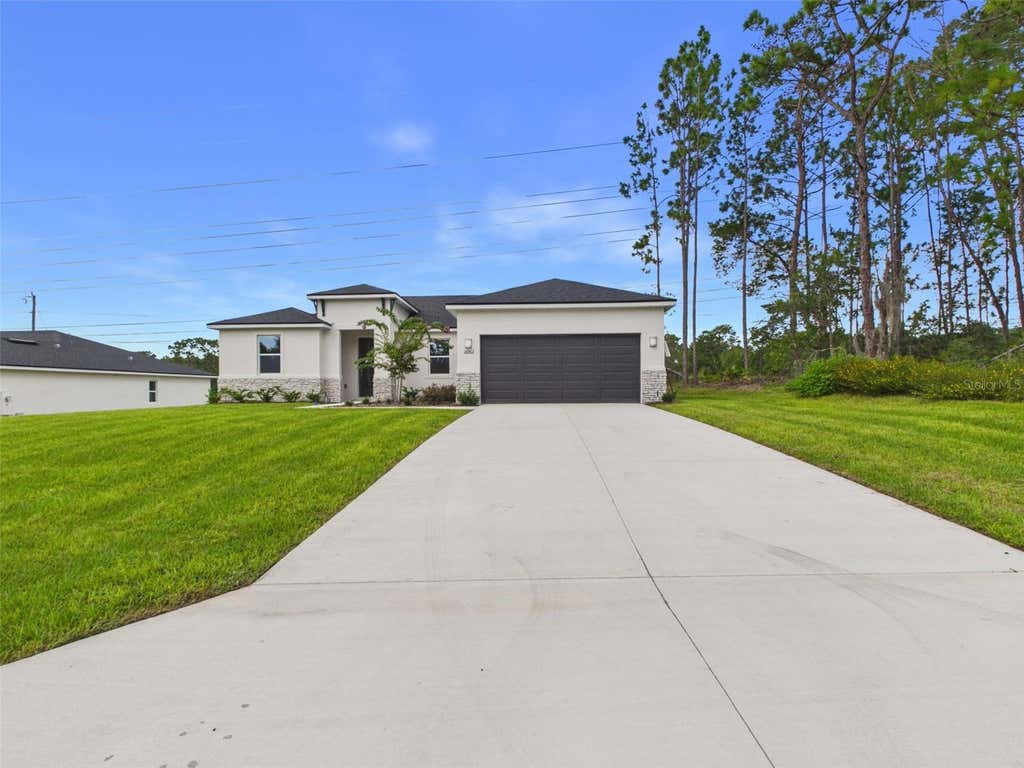 Photo of 16962 SW 44th Circle, Ocala, FL 34473 (MLS # OM730261)
