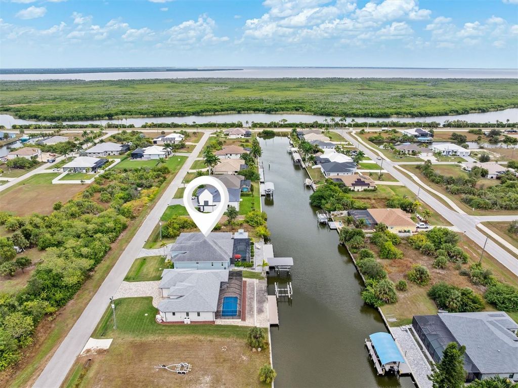 Photo of 15650 Meacham Circle, Port Charlotte, FL 33981 (MLS # C7518869)