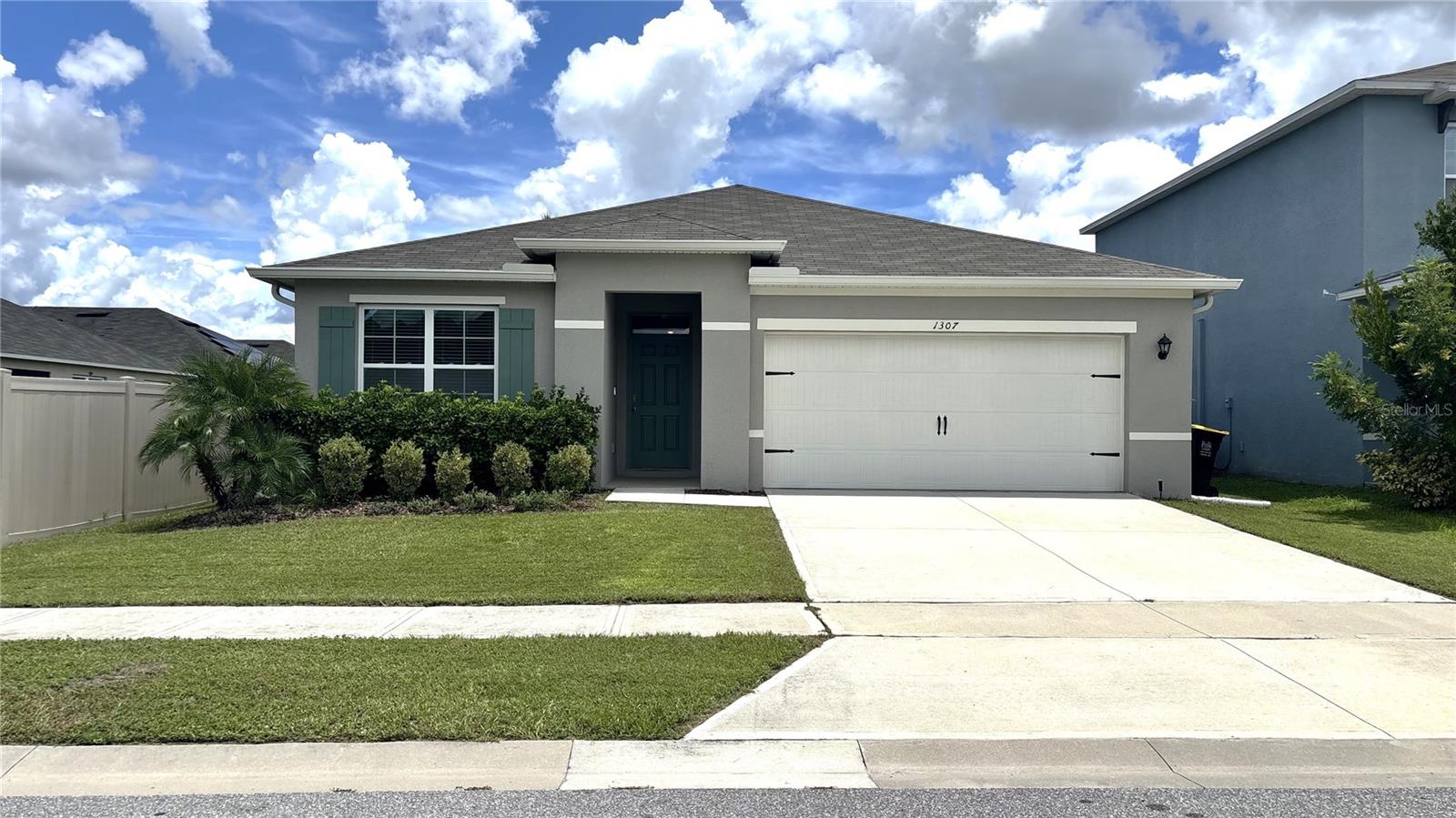 Beautiful home!!! Located right next to Championsgate. 3-BED, 2-BATH single story Home with 2-Car Garage in the beautiful neighborhood of MEADOW WALK. Come see this spacious home with upgraded countertops, tile and laminate floors throughout, The house is built with block over block construction and is also wired to be a smart home. The home features a beautiful open kitchen with stainless steel appliances and an island great for entertainment. No neighbor on the back. Ideally situated with easy access to State Road 27 and just minutes away from I4 commuting is a breeze. Enjoy the convenience of nearby shopping with Publix and Walmart just minutes away. The home is also located near restaurants, schools, Disney, Posner Park and much more. WE SHOW PROPERTIES 7 DAYS A WEEK! An administrative fee of $75.00 will be charged at the time of move-in.