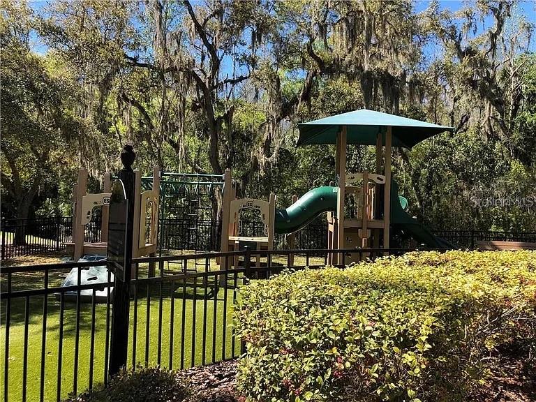 OXFORD PLACE AT TAMPA PALMS A CONDO - Residential