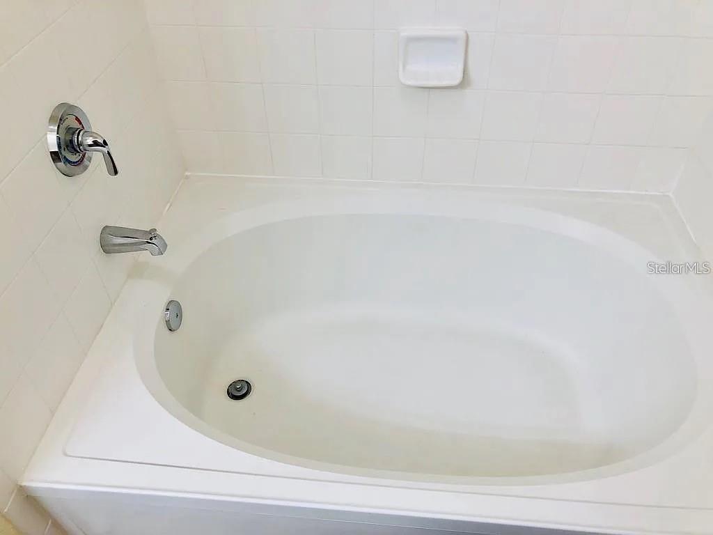 OXFORD PLACE AT TAMPA PALMS A CONDO - Residential