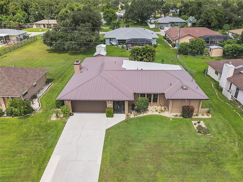 Photo of 21460 Sheldon Avenue, Port Charlotte, FL 33952 (MLS # C7511189)