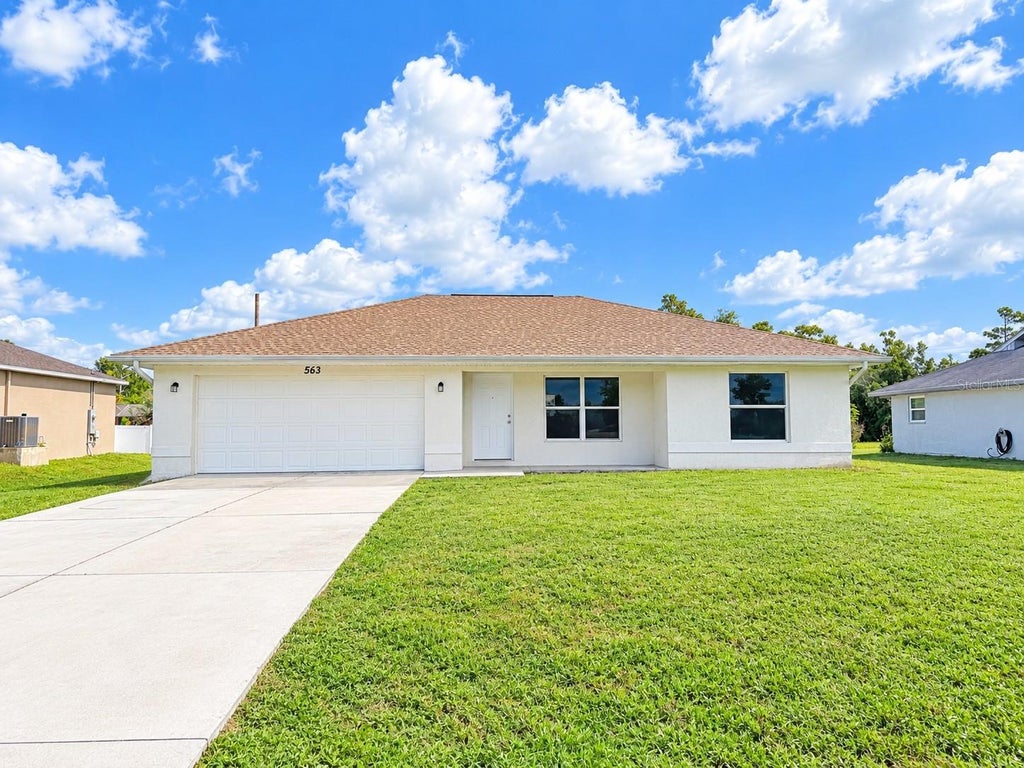 Photo of 563 Verona Street, Port Charlotte, FL 33948 (MLS # C7532536)