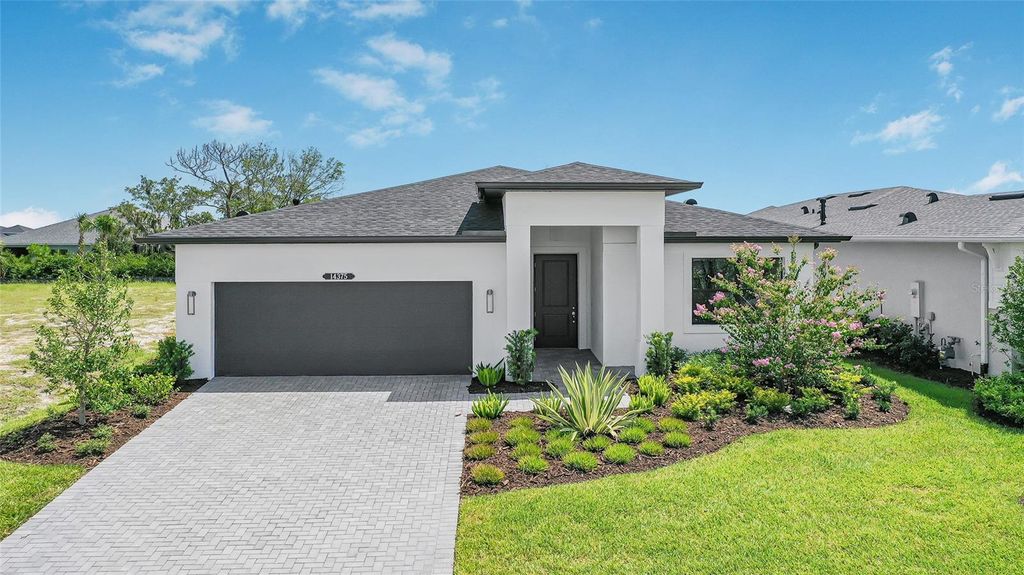 Photo of 14375 Hammock Oak Street, Parrish, FL 34219 (MLS # O6322062)