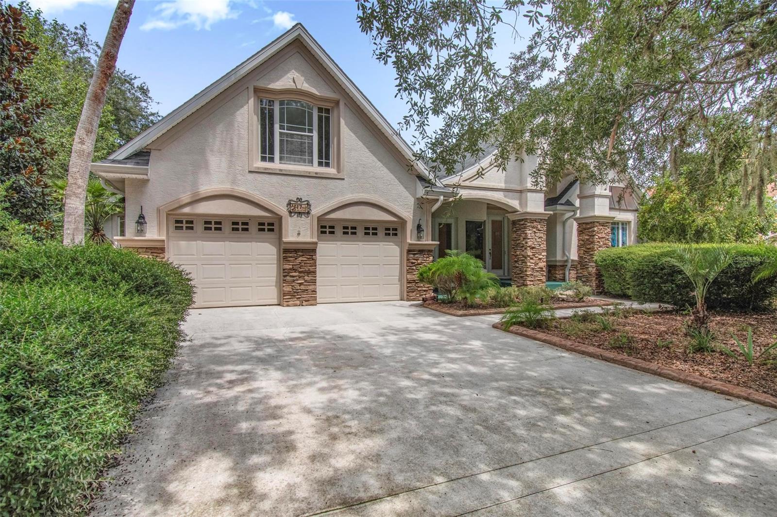 Nestled in the quiet cul-de-sac of Grandview Drive, this exceptional property combines privacy, comfort, and luxury living in the prestigious Grand Haven community’s Marsh Crossing neighborhood. The oversized lot frames a 4 bedroom, 2 and 1 half bathroom residence offering 3,395 sq. ft. of refined living space, thoughtfully designed for both elegance and functionality.
From the moment you enter, soaring ceilings and expansive windows create a bright, welcoming atmosphere. An open-concept layout flows seamlessly into living and dining areas, with built-ins and sliding glass doors leading to an inviting lanai. One of the highlights is a spacious mother-in-law suite, ideal for guests, multigenerational living, or maybe even a dedicated theater room!
The primary suite delivers a true retreat experience, featuring a spa-style bath with a soaking tub, walk-in shower, and dual vanities. Flexible additional rooms can serve as bedrooms, a home office, or a den adapting easily to your lifestyle. Step outside to a screened, indoor/ outdoor covered patio with a summer kitchen, perfect for year-round enjoyment and views of the lush golf course.
As part of Grand Haven, you’ll have access to exceptional amenities including two heated resort-style pools, two fully equipped fitness centers, scenic walking and biking paths, tennis, pickleball, volleyball, basketball, and croquet courts, an on-site café, an optional Jack Nicklaus golf club membership, and 24-hour gated security.
Positioned minutes from the beach, shopping, dining, and top-rated schools, this home offers the perfect blend of convenience and resort-style living.