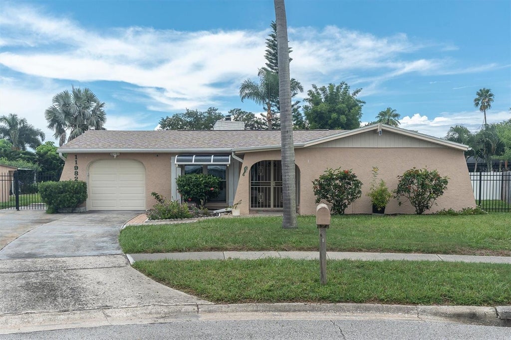 Photo of 11982 Tangelo Court, Seminole, FL 33772 (MLS # TB8546145)