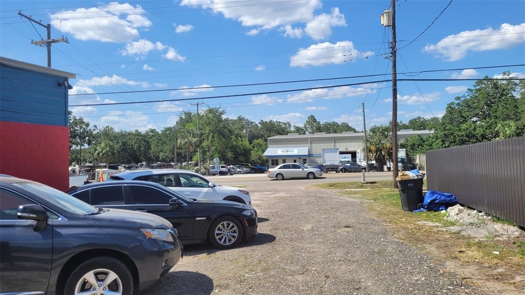 Photo of 9701 N Tampa Street, Tampa, FL 33612 (MLS # TB8550555)