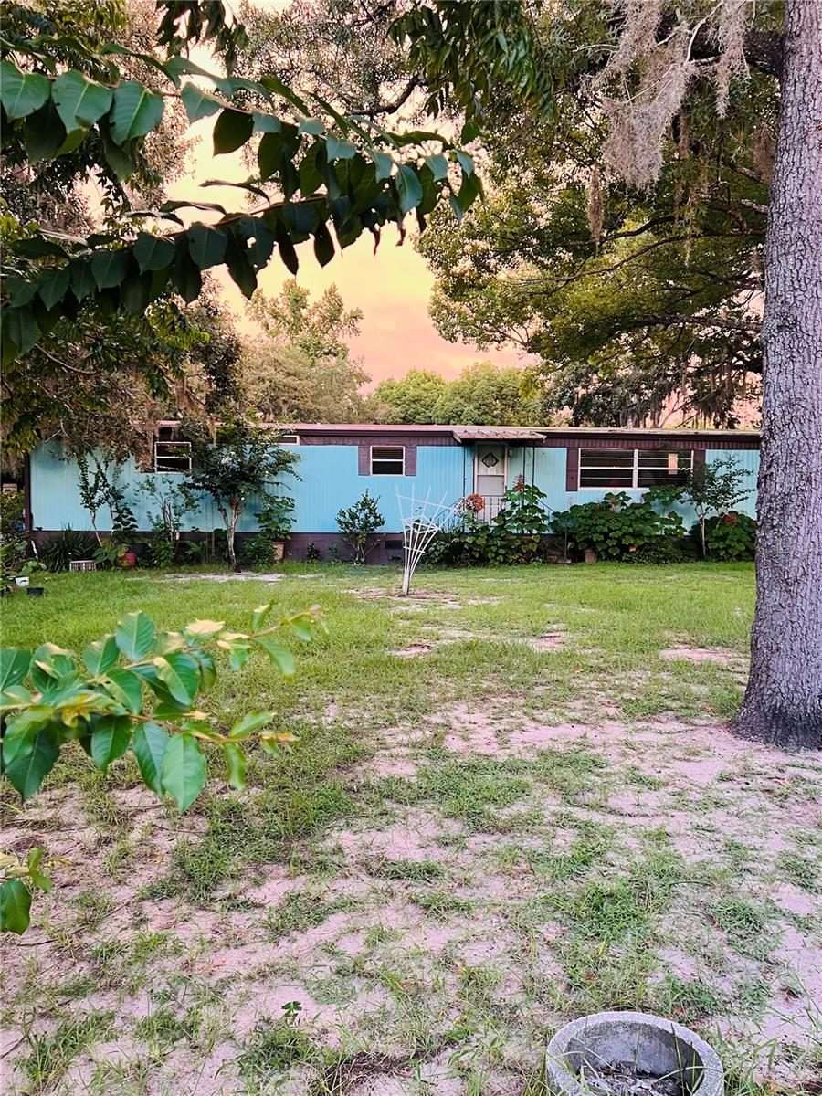 Imagine coming home to your own private acre in Spring Hill, complete with a sparkling in-ground pool, soothing spa, and screened enclosure perfect for Florida living. This spacious 3-bedroom, 2-bath offers room to spread out inside and out, plus multiple sheds, a carport, and plenty of outdoor space for hobbies, toys, or even a garden. Inside, enjoy a bright layout with a comfortable living area, roomy kitchen, and inviting bedrooms. Tucked away in a peaceful setting yet close to shops, dining, and schools — this property gives you the best of both worlds.