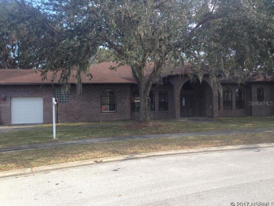 Under contract taking backups. If you are looking to own a Port Orange Palace, this one is for you. Though it needs some TLC, this property has great bones with an amazing floor plan. Set on a double lot the massive square footage of this home allows for ALL rooms to be large in size with the bedrooms all set up as suites with their own bathroom & walk-in closet. Grand foyer and extremely tall ceilings give a luxurious feeling the moment you walk in. 4 bedroom suites in a split floor plan PLUS an office, formal living & dining rooms, huge family room & more. The Owner's Suite is gigantic with a bonus sitting area that leads out to the pool. Like everything else on this property, the pool is jumbo with a built in spa. See attachment for PAS requirements and WFHM offer submittal information in MLS document section. ;Water: City