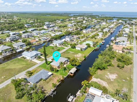 Photo of 24398 Treasure Island Boulevard, Punta Gorda, FL 33955 (MLS # C7510960)