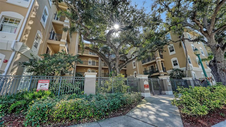 Welcome home to this top-floor end-unit residence offering a private, treehouse-style setting in a desirable low-rise condominium in the heart of downtown Sarasota. This stylish mid-century modern home features a partial bay view, abundant natural light, and a completely remodeled kitchen and utility room. Thoughtfully updated with a new HVAC system, water heater, stainless steel appliances, ceiling fans and custom window treatments, the property is move-in ready and includes tasteful, turnkey furnishings. Ideally just near Pioneer Park with open green space, recreational paths and tennis courts, and within a short distance to Bay Park, downtown dining, shopping, arts and the waterfront. An exceptional opportunity for full-time living, a seasonal retreat or investment ownership.