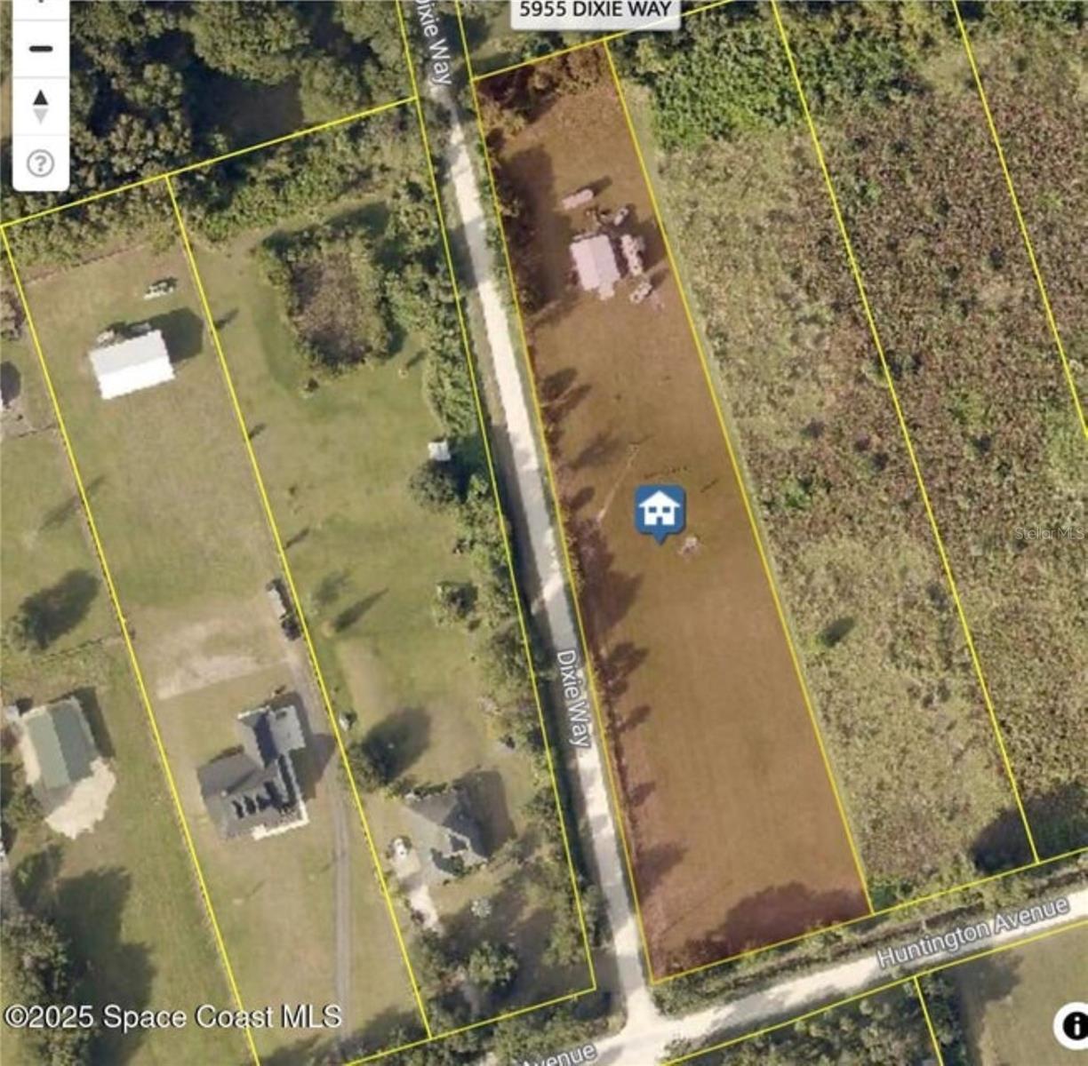 Your Dream Home location awaits! Discover the possibilities on this cleared and beautiful 2.86-acre property in a peaceful area just outside of town. Featuring a 30 x 40 metal building with 220 power, a 10-foot roll-up door and a finished office that is air conditioned with 2 portable units. There is an additional 300 amps of power for your to be built main house. There are three 50amp RV hookups on the property and a well has been put in too. The grounds are enhanced with fruit trees, a garden and 3 chicken coops for a self-sustaining lifestyle. Situated just one mile from the Scottsmoor Landing boat ramp, this is a rare opportunity to enjoy country living with quick access to outdoor recreation and approx. 15 minutes north of Titusville and all of it's amenities. A quick commute to KSC and international airports.