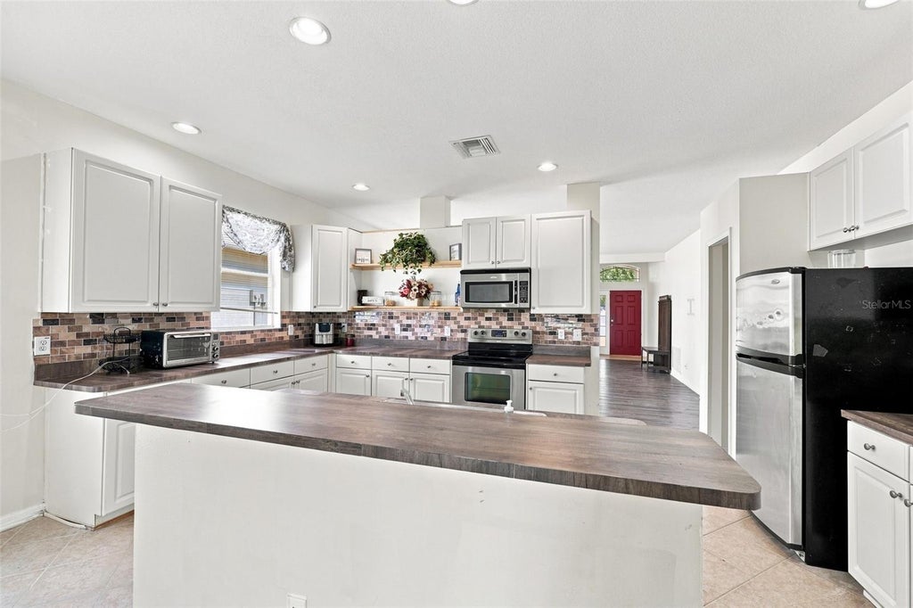 Photo of 8814 Southern Charm Circle, Brooksville, FL 34613 (MLS # W7889288)