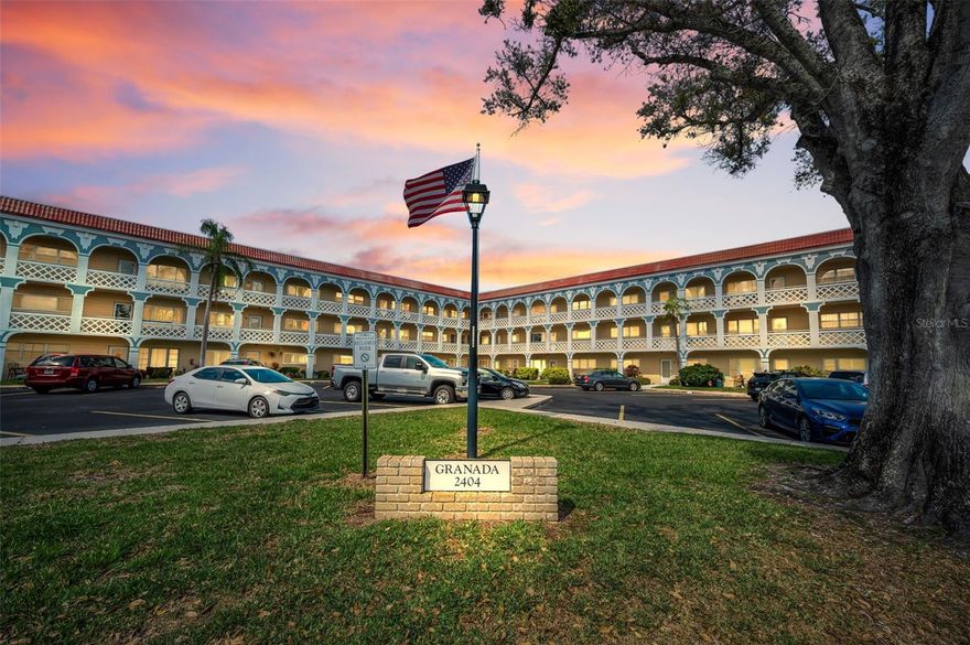 Discover an inviting FULLY FURNISHED, TURN-KEY READY ground-floor, corner condo WITH GOLF COURSE VIEWS that combines effortless accessibility, everyday comfort, and a the vibrant senior community of On Top Of The World in sunny Clearwater, FL!  A private parking space directly in front of your door makes coming and going a breeze, while the sunlit, thoughtfully designed layout provides generous living spaces without the need for stairs.  Offering two bedrooms, two full baths  (primary suite offers an en-suite bath with accessible oversized roll-in shower for convenience), a large sunny Florida Room (great flexible space for guests, a home office, or a tranquil retreat), as well as a welcoming covered front porch and spacious rear patio for grilling or relaxing in the sunshine!  This spacious condo provides low-maintenance living with premium comfort with updated touches and a practical flow that maximize ease and enjoyment, from morning coffee to evening relaxation. For the active lifestyle, a full suite of community amenities is offered --- Community Golf Course (golf included in the monthly fees!), swim your choice of 2 pools, stroll with your dog at the on-site dog park, and stay active in the well-equipped fitness center. A diverse calendar of clubs and groups ensures there’s something for every interest. Active, social, and supportive -- An engaging environment that balances independence with opportunities to connect, learn, and grow—perfect for seniors who want to stay active and involved. This ground-floor corner unit is designed for easy living today with the lifestyle you’ll love tomorrow.