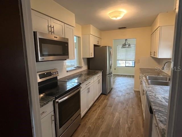2832 NW 44TH PLACE