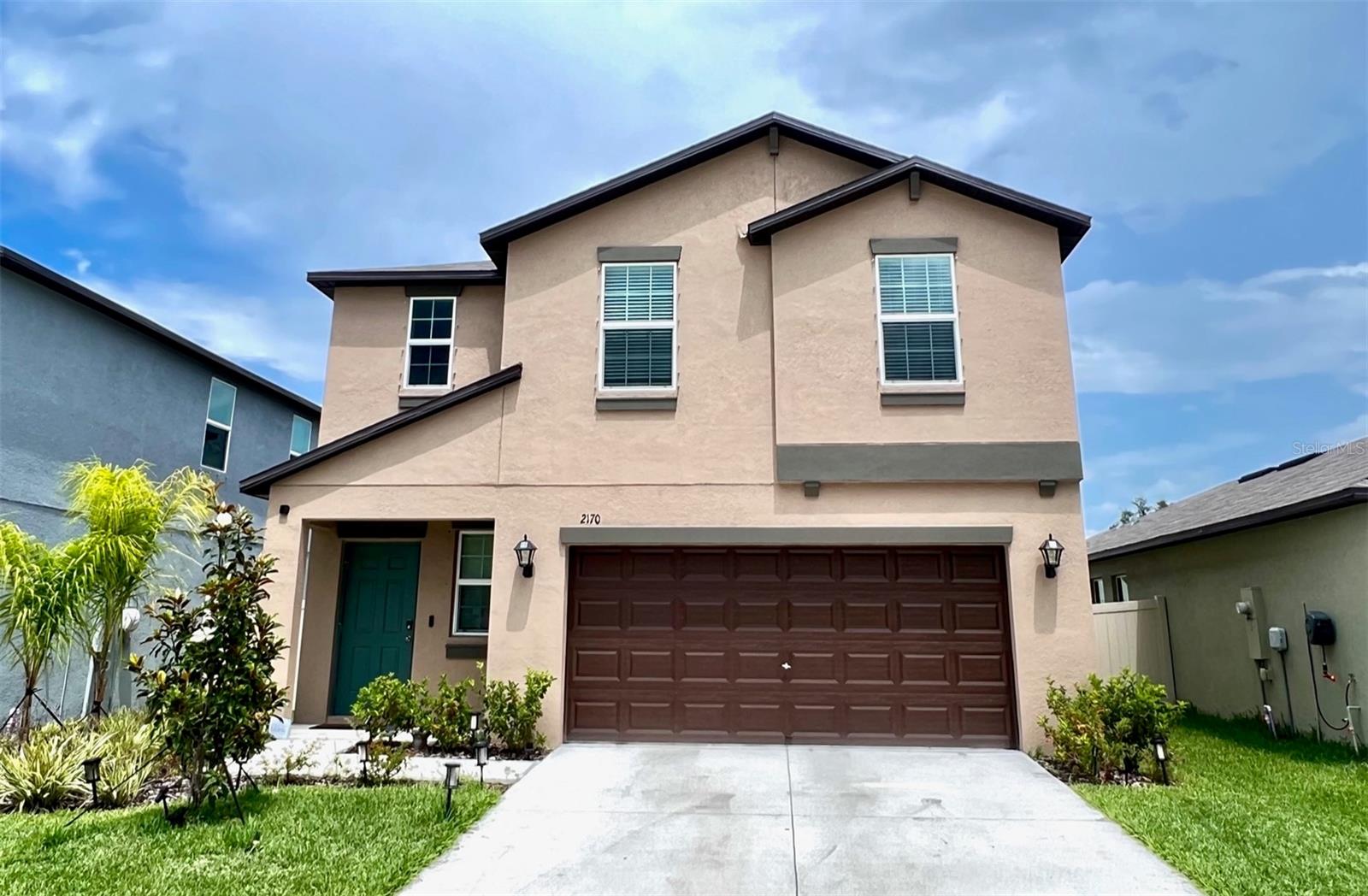 Nestled in the heart of a charming, family-friendly neighborhood, this house is just minutes away from schools, parks, shopping centers, and major highways, ensuring convenience at your doorstep. Situated along one of the hottest corridor in Florida, this 2022 built 4BR 2.5 Bath 2 car garage with dual overhead storage units is move in ready. It is just 20 minutes away from Tampa International Airport and 35 min away from Honeymoon Island Beach. The open floorplan concept combines the living room and dining room which creates a cozy atmosphere. The state-of-the-art kitchen is equipped with top-of-the-line stainless steel appliances, granite countertops, and an expansive island - perfect for entertaining. Several upgrades include newly installed backsplash in the kitchen, newly added stylish medicine cabinets in all bathrooms; new dining room light fixtures; newly installed privacy vinyl fence; and new solar coach lights in the garage. Front exposure of the home is a nice, landscaped conservation area with a few extra parking spaces for your guests. A new K-8 Elementary/Middle school is scheduled to open up in 2025 school year which is being built just one block away on SR-54, behind the subdivision. Suncoast Veterans Hwy 589 is 2 miles away, and I-75 is 8 miles away. Major shopping areas like Tampa Premium Outlets, Costco. and major eateries are within 15 minutes. Nearby entertainments such as Tiger Woods Pop Stroke, Main Event and many more weekend outings are in close proximity. Live and work where tourists vacation. Your home away from home is just a call away. Make it a reality today!