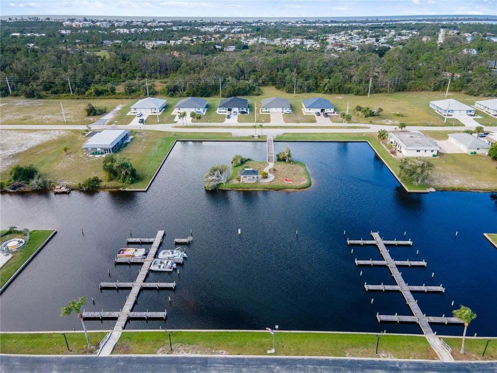 Photo of 140 Rotonda Circle, Rotonda West, FL 33947 (MLS # C7517071)