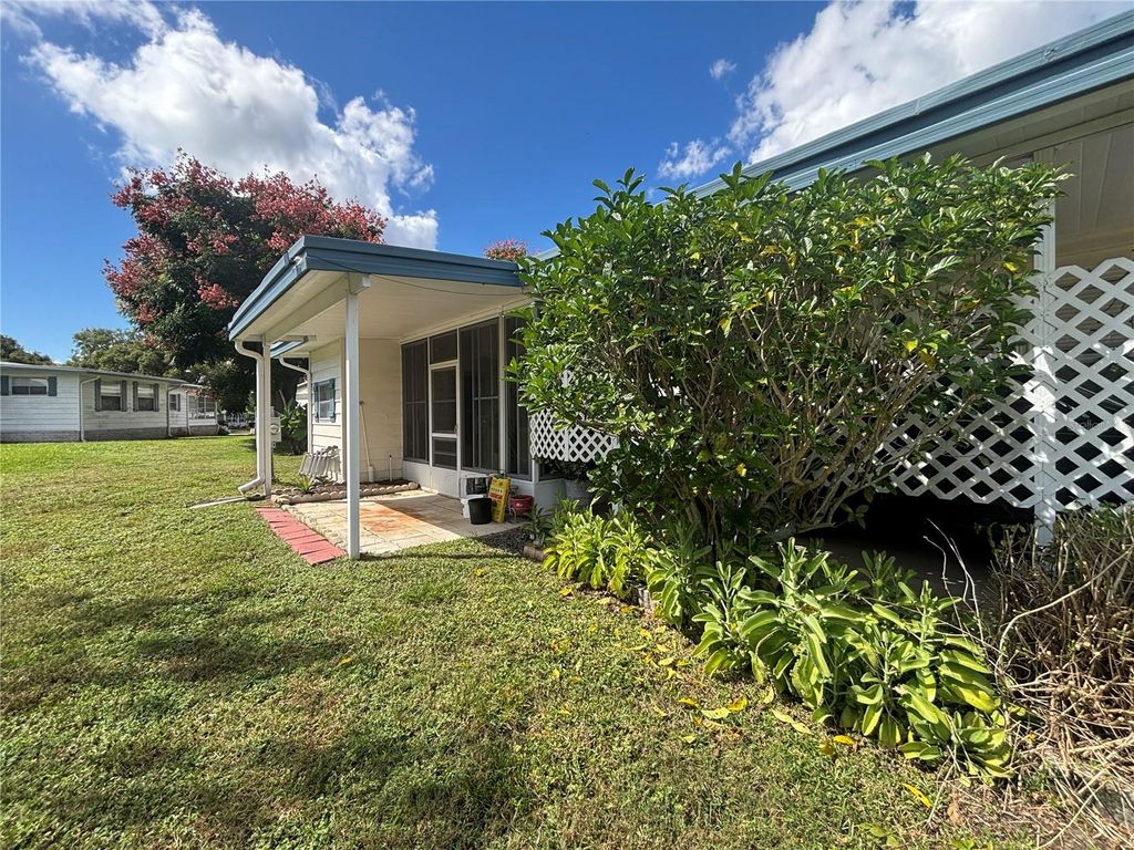 Photo of 2122 E Lake Drive #GE, Zellwood, FL 32798 (MLS # O6354361)