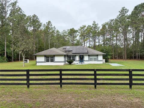 Photo of 12748 NW 148th Terrace, Alachua, FL 32615 (MLS # GC540301)