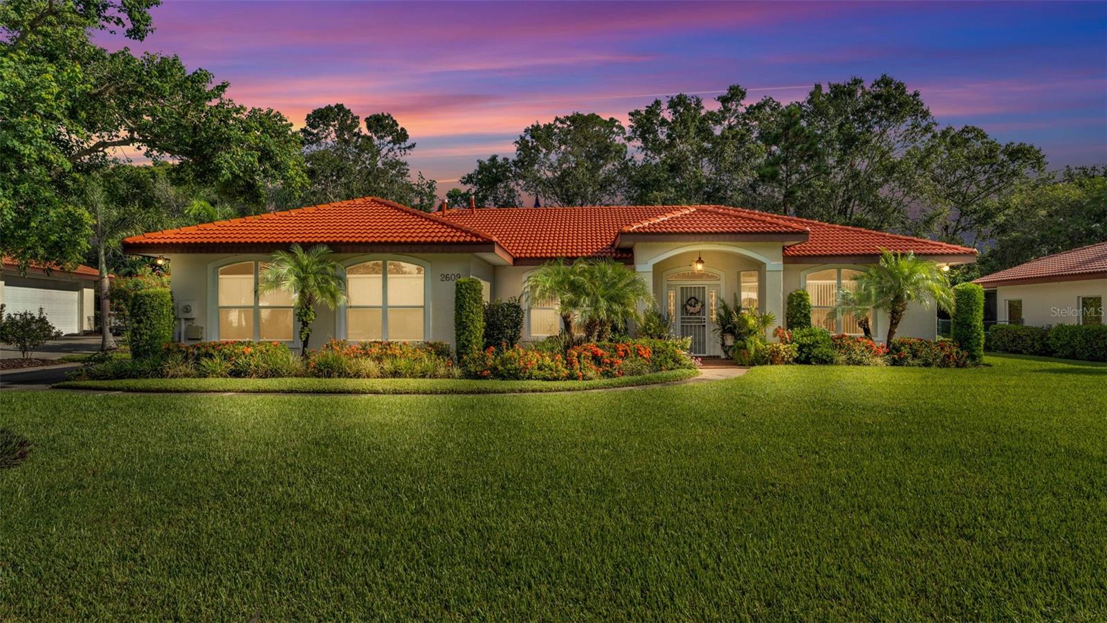 Beautifully maintained 3BR/2BA home on a quarter-acre lot, tucked away on a quiet cul-de-sac in the sought-after Lake Wales Country Club. Natural light fills the home, which boasts a split floor plan with a private master ensuite and tile flooring throughout the main living areas. This home has been well cared for and features a new water heater, new washer and dryer, a drainfield installed less than five years ago and a generator-ready setup for added peace of mind.
The kitchen features granite countertops, maple cabinetry, a double pantry for extra storage, and a built-in office nook. Enjoy the benefits of a natural gas hookup, which provides consistent performance for cooking, heating, and more.
The spacious Florida room overlooks a lush, landscaped backyard with no rear neighbors, offering exceptional privacy and a peaceful view.
Step outside to your private outdoor retreat, complete with a patio and gazebo and a natural gas hookup for your grill. It is perfect for weekend barbecues or simply unwinding after a day on the golf course.
Enjoy resort-style amenities including a heated community pool, tennis courts, and golf course access, all while savoring the privacy and tranquility of your own home. Whether you are looking for a high-end winter retreat or a serene full-time residence, this property offers the perfect blend of comfort, style, and low-maintenance living.
