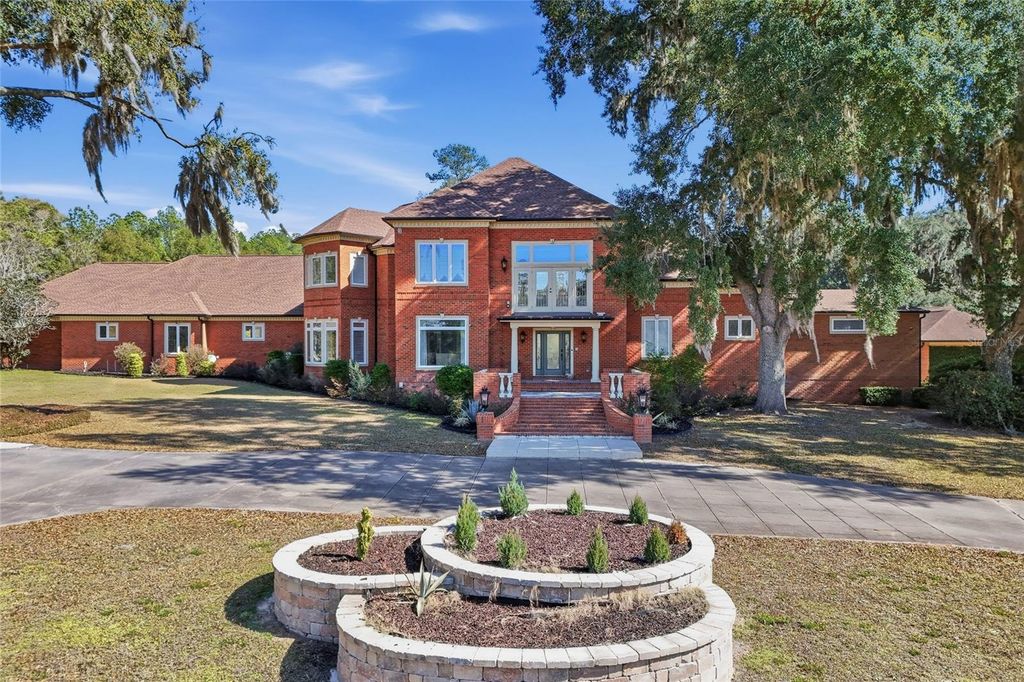 Photo of 385 SE Nature Drive, Lake City, FL 32025 (MLS # GC537288)