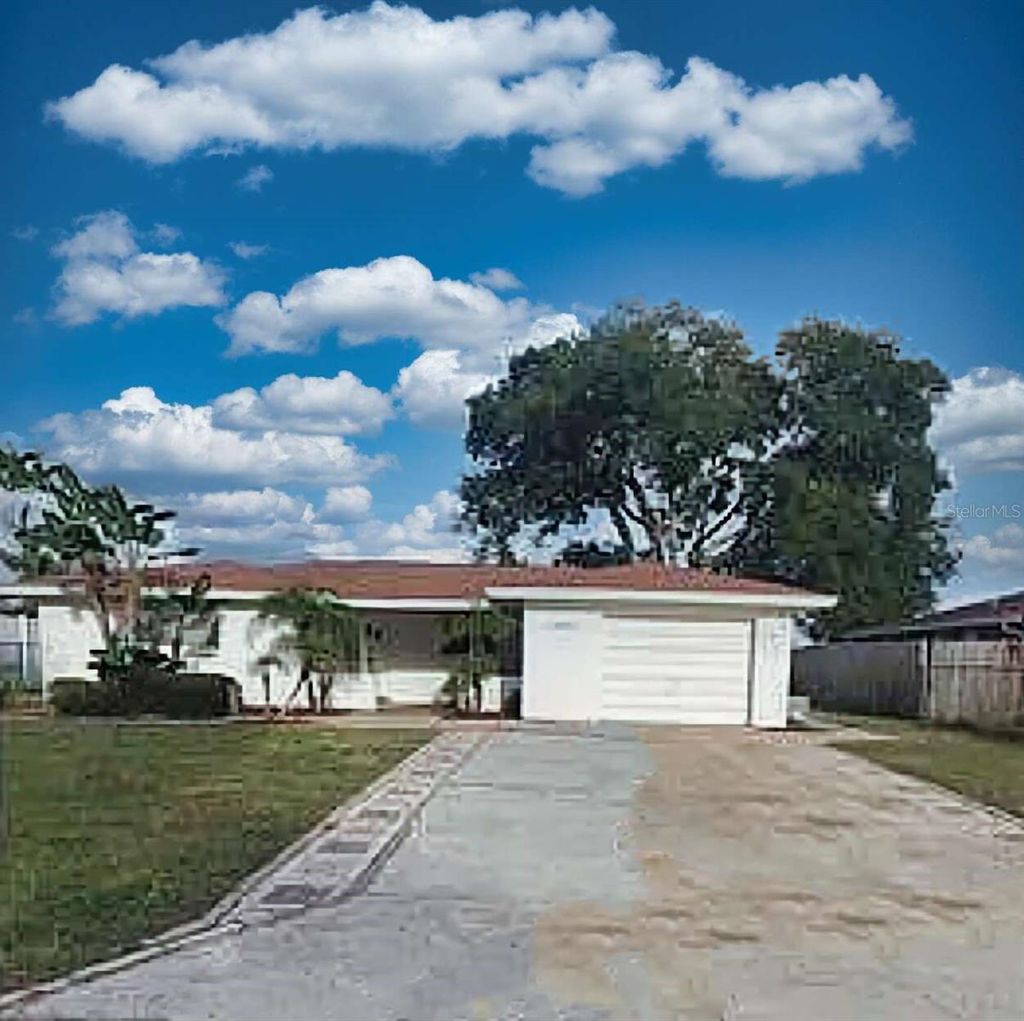 Photo of 10332 Honeysuckle Lane, Port Richey, FL 34668 (MLS # A4680478)