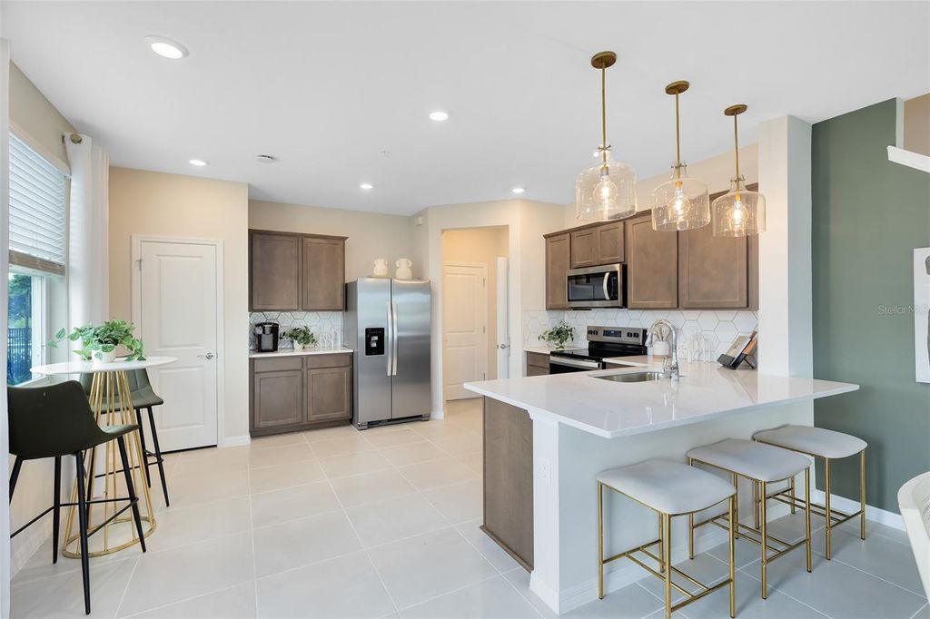 Photo of 3242 Pondside Way, Sanford, FL 32773 (MLS # O6417136)
