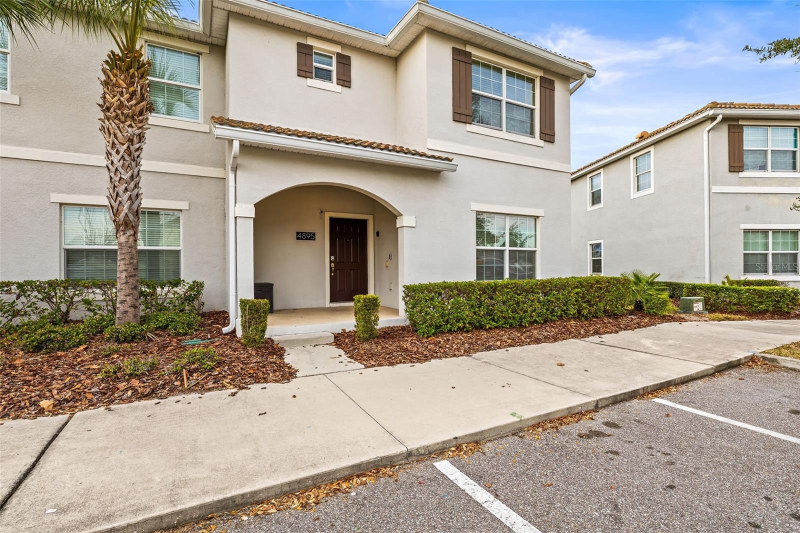 Turn-key and fully furnished, this 5-bedroom, 4-bathroom vacation townhome is located in the sought-after, short-term rental–zoned community of Storey Lake Resort — just minutes from Walt Disney World, Universal Studios, SeaWorld, and Orlando International Airport. Professionally decorated with themed bedrooms and upscale finishes, this home is a consistent top-performer for vacation rental income.
The functional floor plan includes 5 spacious bedrooms: 2 king suites, 1 queen room, and 2 themed twin rooms (Harry Potter and Mickey Mouse). There are **4 full bathrooms total—2 en-suite and 2 full shared baths—**designed for convenience and guest privacy. The open-concept kitchen and living area includes a large center island, stainless appliances, and flows seamlessly to the outdoor covered lanai. Enjoy your private screened-in splash pool, complete with fire pit, child safety gate, and outdoor seating —perfect for entertaining or relaxing after a day at the parks.
Resort amenities include TWO different clubhouses, which boast heated pools, a lazy river, waterslides, splash pads, 9-hole mini-golf, tiki bar, fitness center, and kayak rentals. The gated community provides 24/7 security and easy access to nearby golf courses, outlet malls, grocery stores, and a wide variety of dining options. An ideal investment opportunity or personal vacation getaway, "Enchanted Escape" offers both exceptional guest appeal and long-term income potential. Schedule your private showing today.